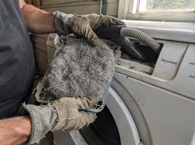 Cleaning Dryer Lint Trap in Pataskala